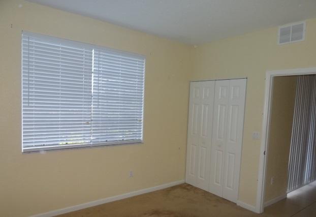 1940 Freeport Drive, Unit 5015 Riviera Beach, FL 33404 - Photo 9 of 10 Bedroom 1, alternate angle