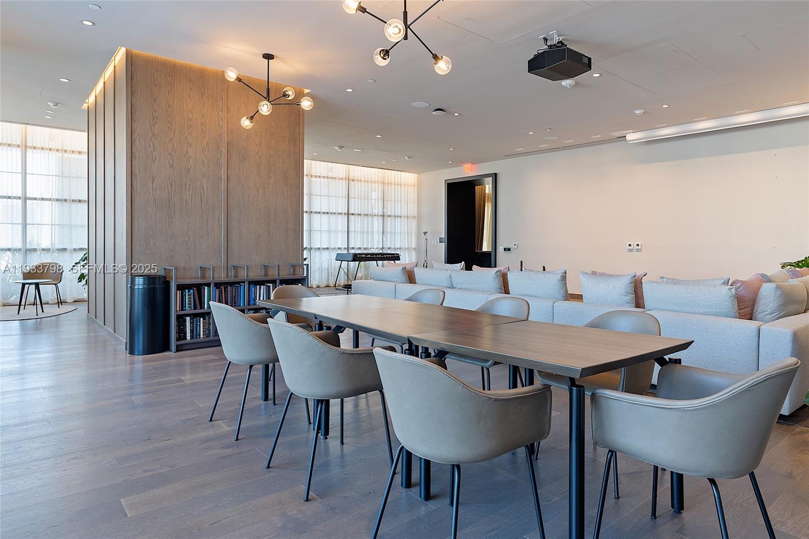159 Northeast 6th Street, Unit 5015 Miami, FL 33132 - Photo 49 of 59 a view of a a dining room with furniture window and wooden floor