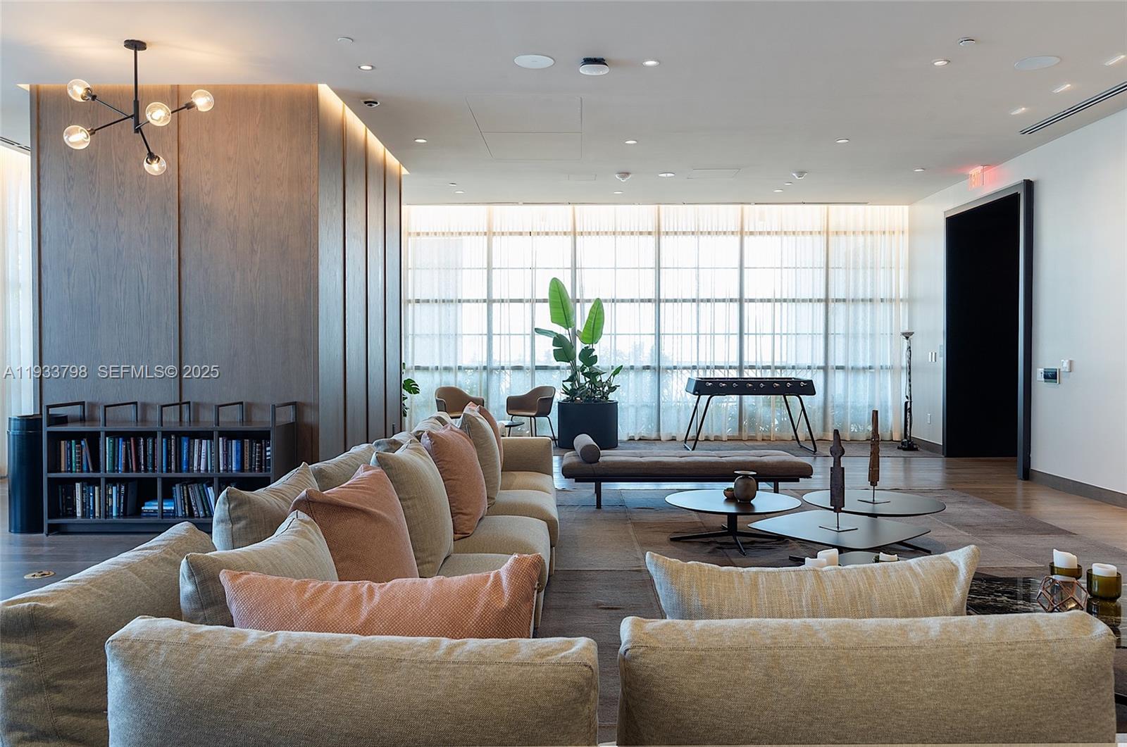 159 Northeast 6th Street, Unit 5015 Miami, FL 33132 - Photo 50 of 59 a living room with furniture and a large window