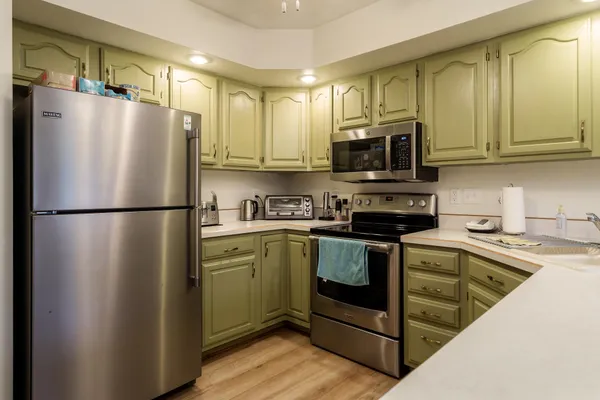 a kitchen with a sink and a window