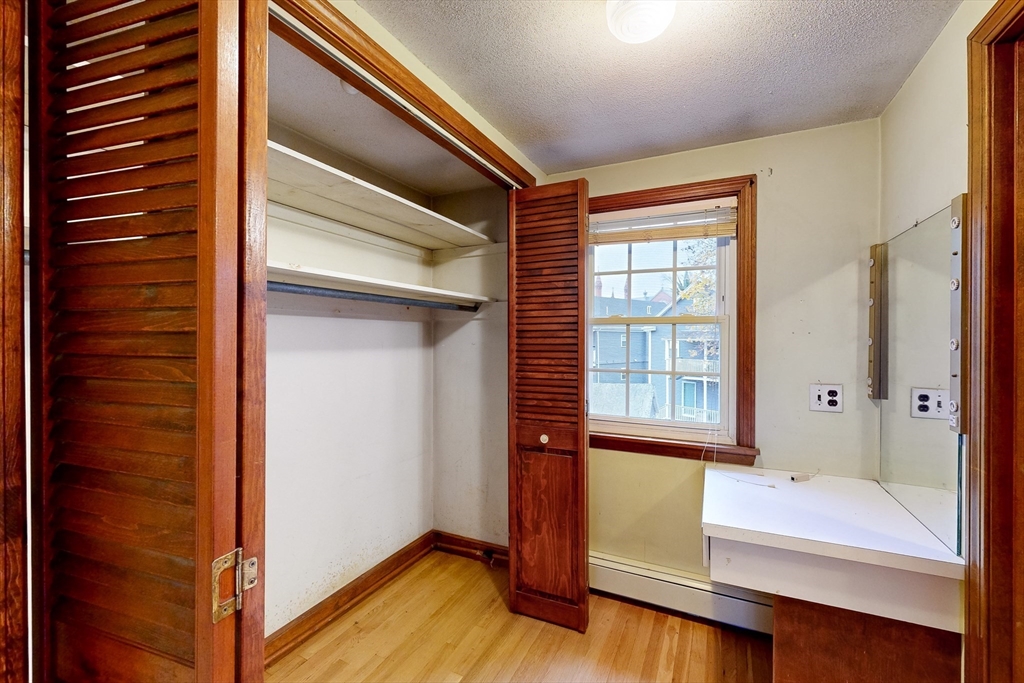15 Rugdale Road Boston, MA 02124 - Photo 21 of 33 a view of an empty room and window