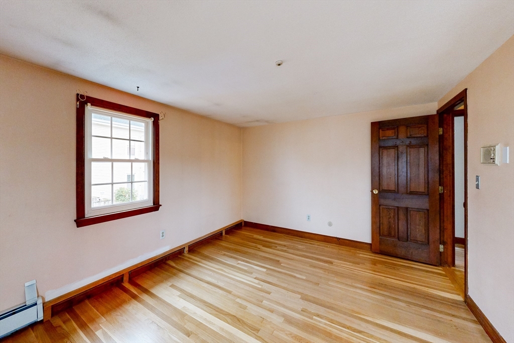 15 Rugdale Road Boston, MA 02124 - Photo 25 of 33 an empty room with windows