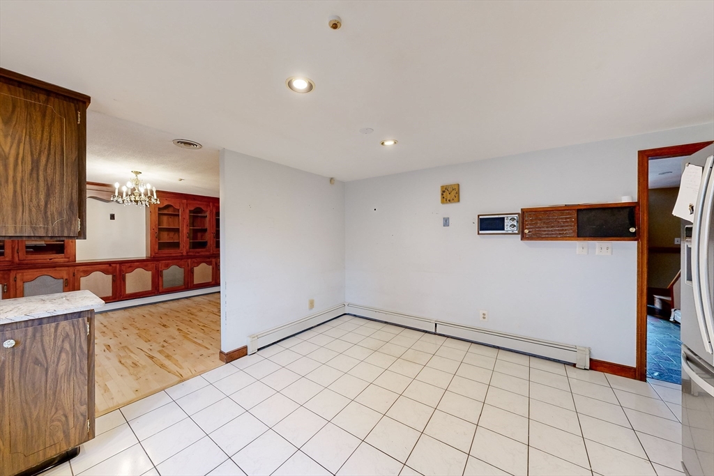 15 Rugdale Road Boston, MA 02124 - Photo 33 of 33 a view of a kitchen with storage and utility