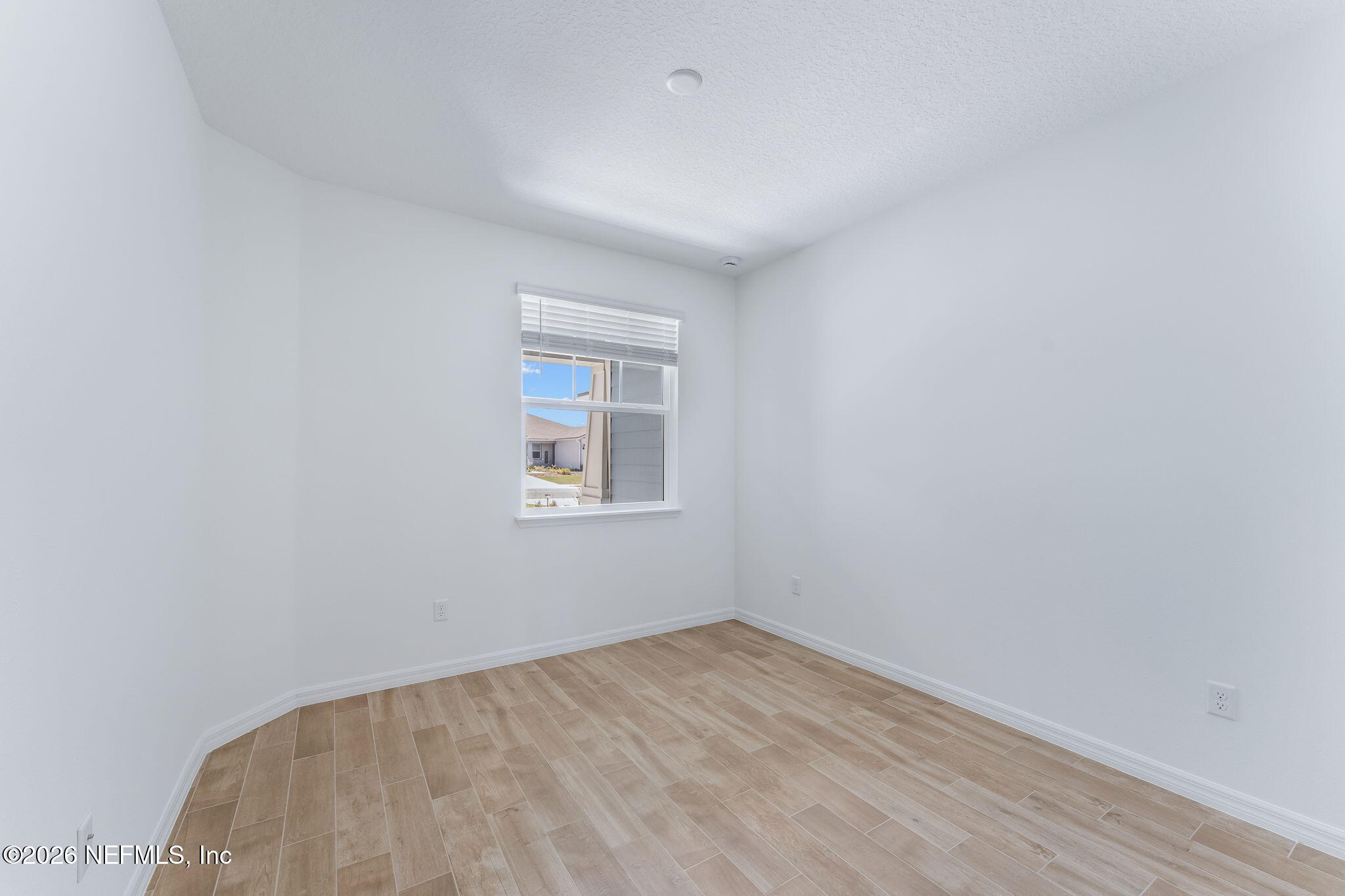 261 Ecliptic Loop Yulee, FL 32097 - Photo 31 of 61 32-web-or-mls-Guest Bedroom