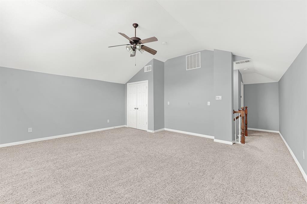 3500 Neiman Road Plano, TX 75025 - Photo 20 of 26 (Bedroom or Game Room) There's a closet, of course, for games, movies, clothes, toys...you name it! The full bath is on the other side of the staircase.