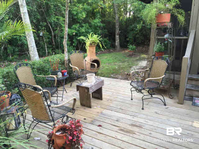 25773 Canal Road, Unit 26 Orange Beach, AL 36561 - Photo 37 of 42 Sitting area near the outdoor kitchen