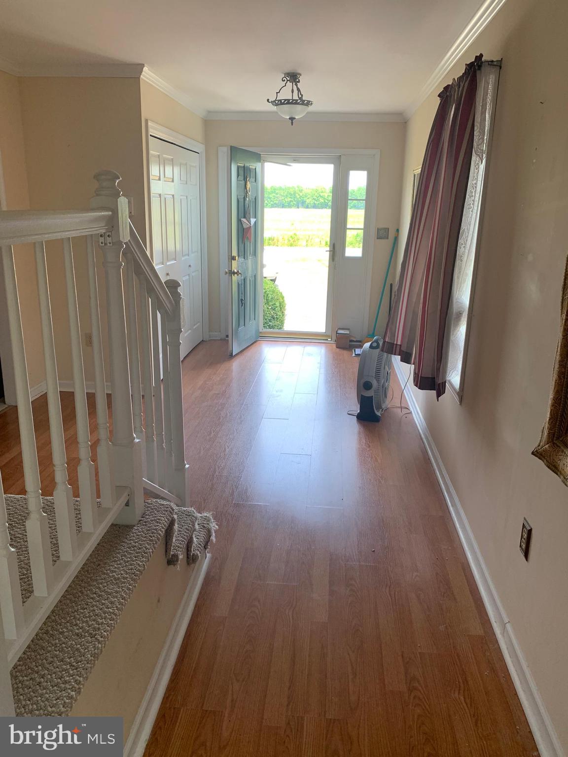 6658 Ganeys Wharf Road Preston, MD 21655 - Photo 21 of 48 VIEW OF FOYER FROM KITCHEN