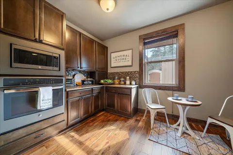 a view of a livingroom with furniture and window