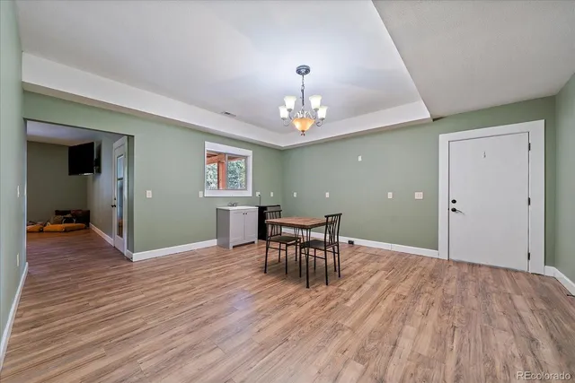 a spacious bathroom with a sink vanity and a toilet