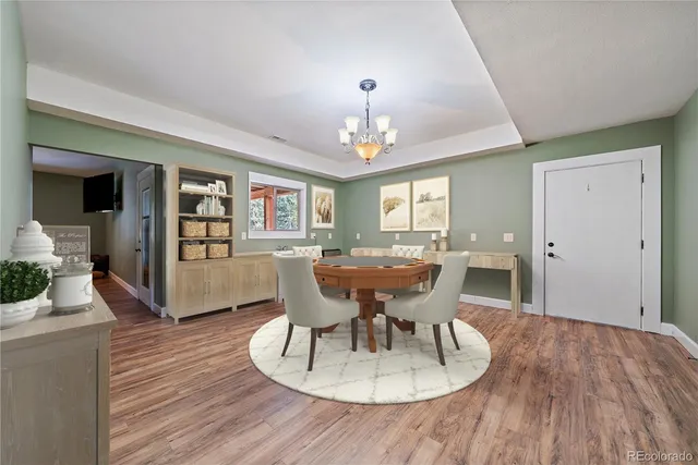 an empty room with closet and ceiling fan