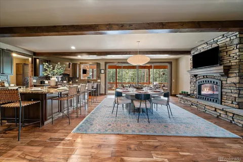 a view of a dining room with furniture window and outside view