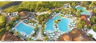 7672 Sussex Court Naples, FL 34113 - Photo 28 of 28 view of a house with a yard