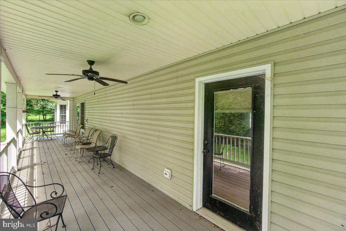 2516 Daisy Road Woodbine, MD 21797 - Photo 71 of 78 Charming porch with serene views.