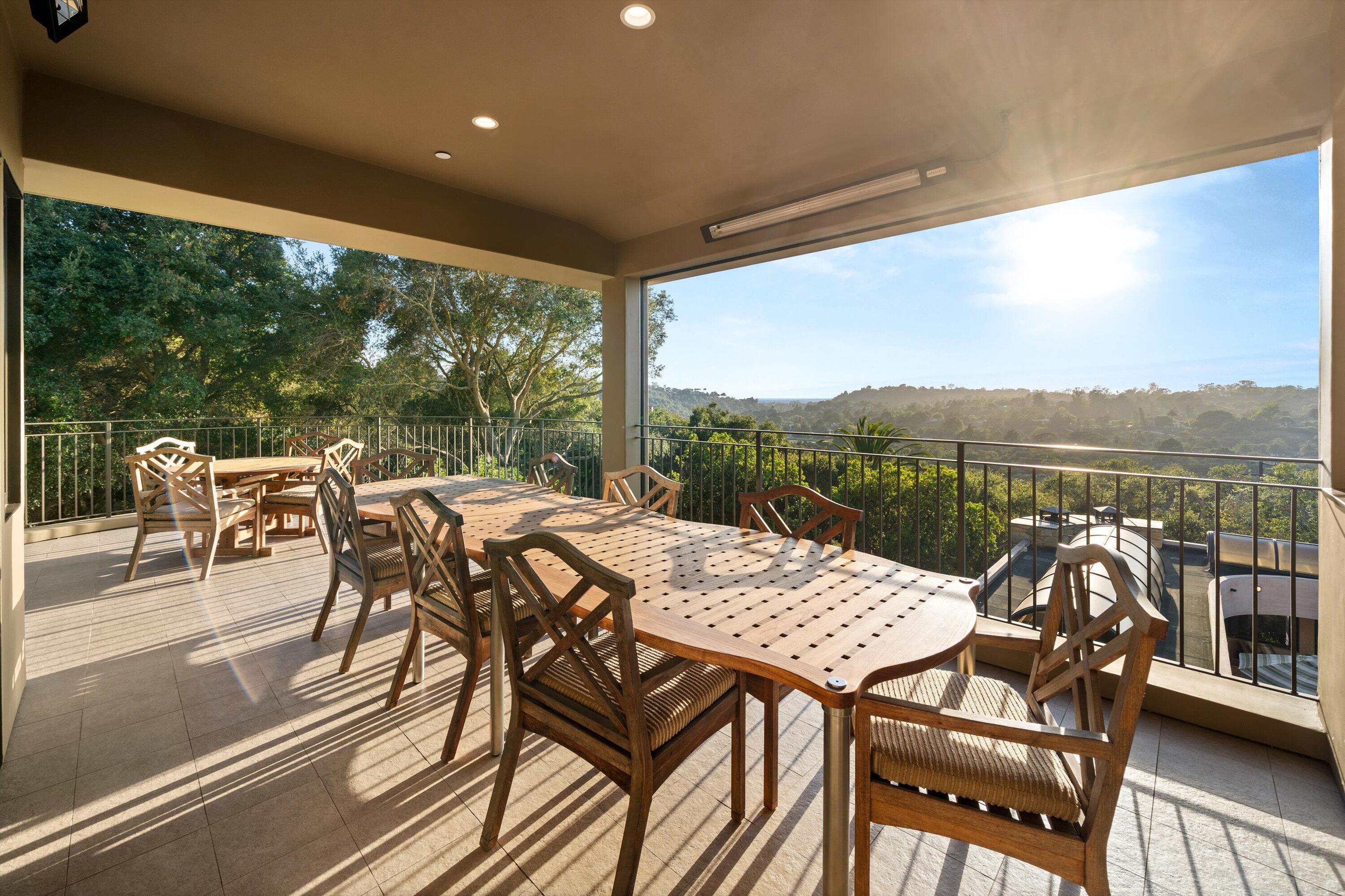 930 Monte Drive Santa Barbara, CA 93110 - Photo 12 of 49 a view of a patio with a table chairs and balcony