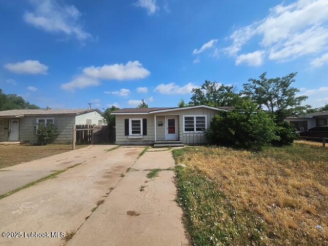 4508 46th Street Lubbock, TX 79414 - Photo 1 of 9 a front view of a house with a yard