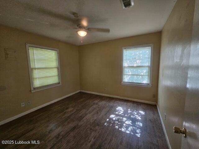 4508 46th Street Lubbock, TX 79414 - Photo 2 of 9 a view of an empty room with a window