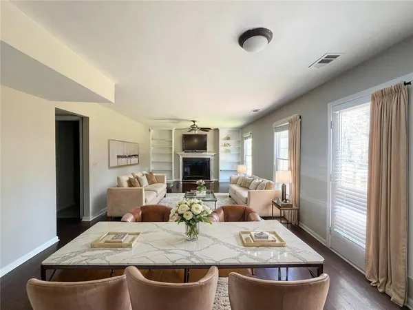 a view of a dining room with furniture