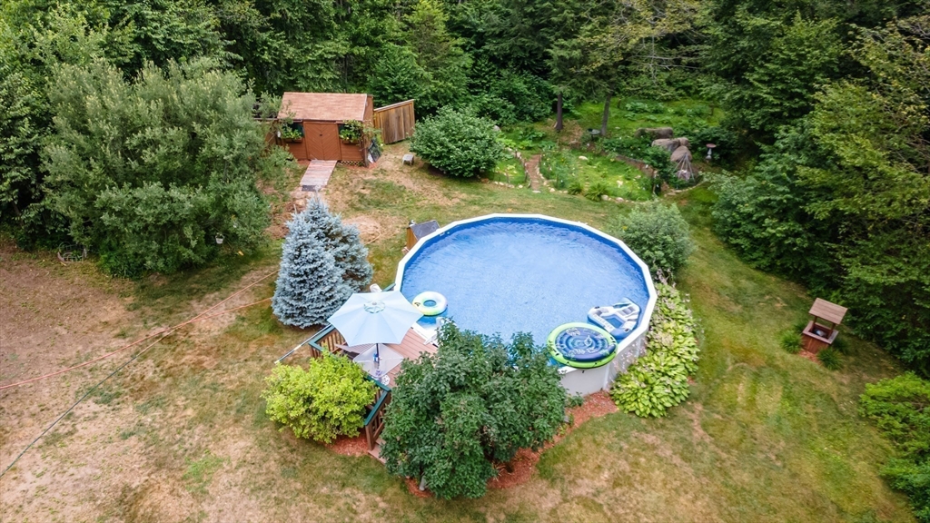 188 Hubbardston Road Templeton, MA 01468 - Photo 25 of 33 an aerial view of a house with a yard and trees