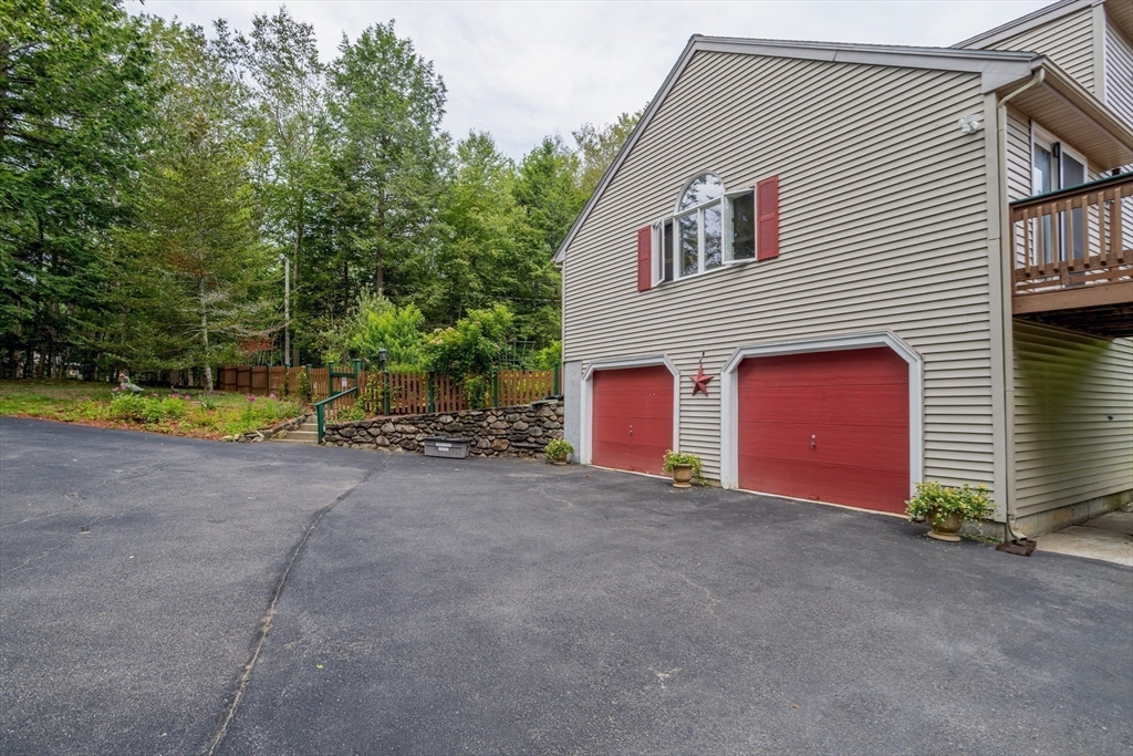 188 Hubbardston Road Templeton, MA 01468 - Photo 26 of 33 a view of a house with a yard and garage