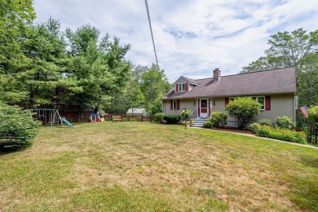 188 Hubbardston Road Templeton, MA 01468 - Photo 33 of 33 a front view of house with yard and trees