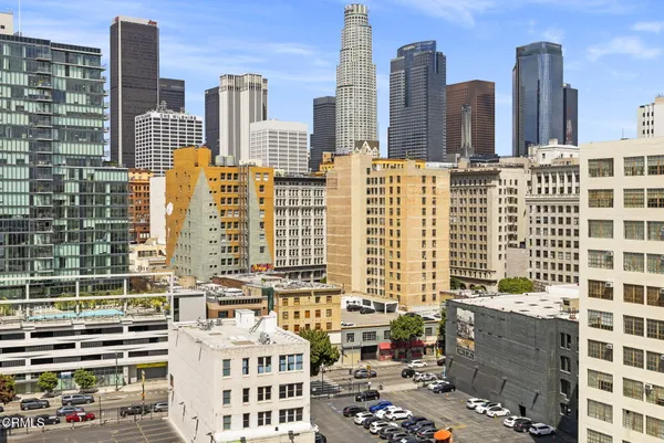 a view of a city with tall buildings