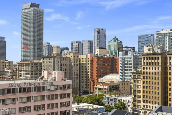 a view of a city with tall buildings