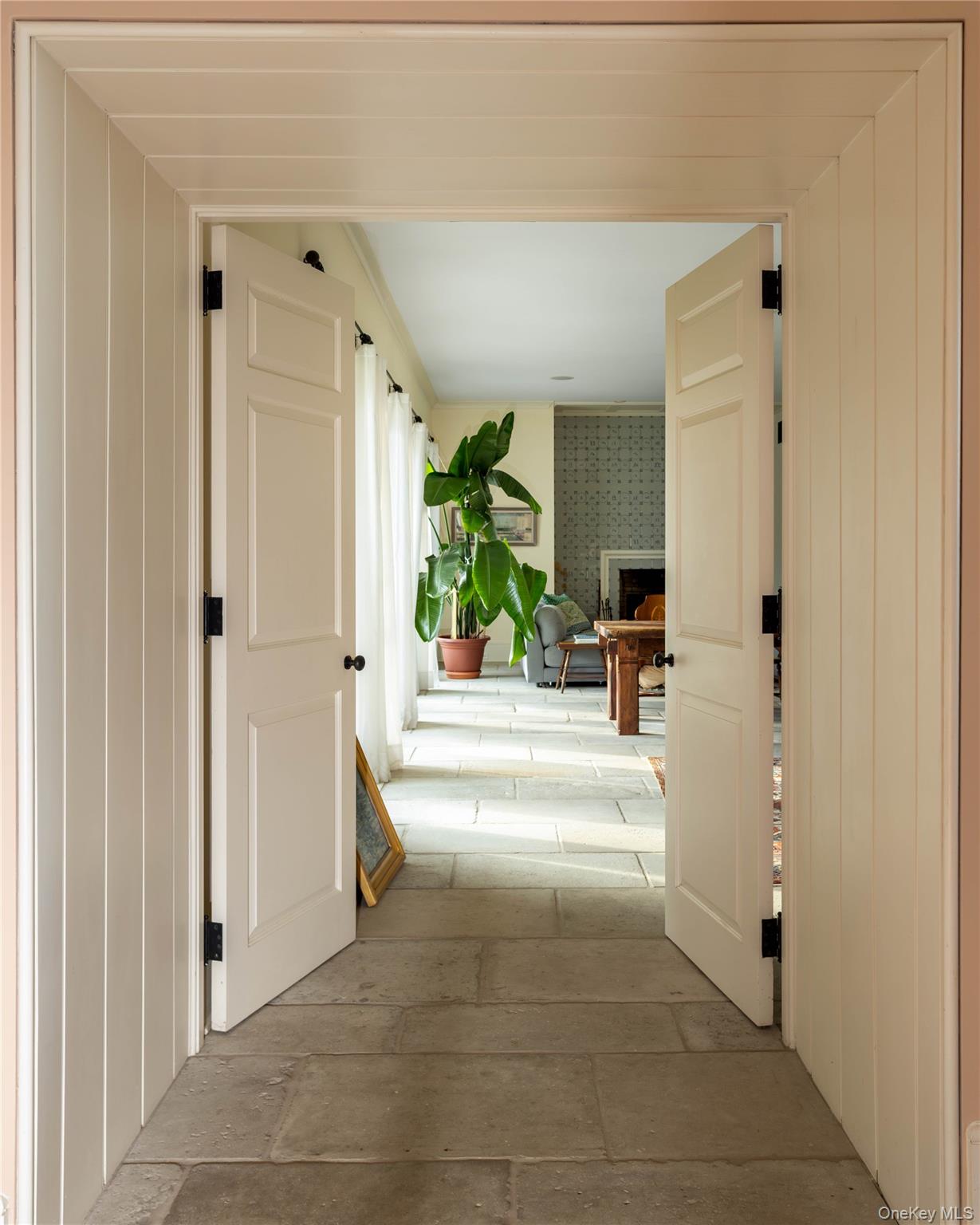 2840 Stars Road East Marion, NY 11939 - Photo 13 of 43 a view of a hallway view with wooden floor and furniture and living room view