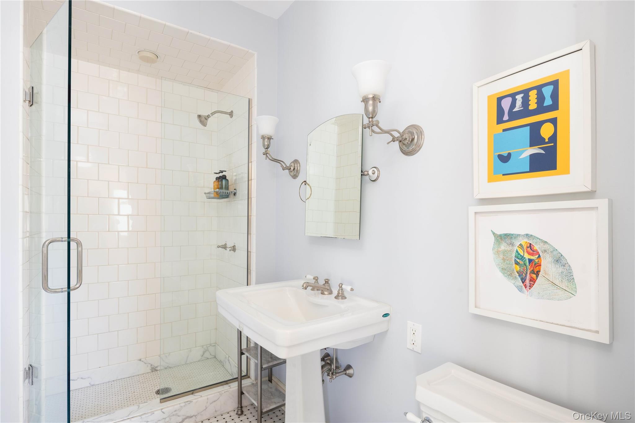 2840 Stars Road East Marion, NY 11939 - Photo 30 of 43 a bathroom with a sink a toilet and shower