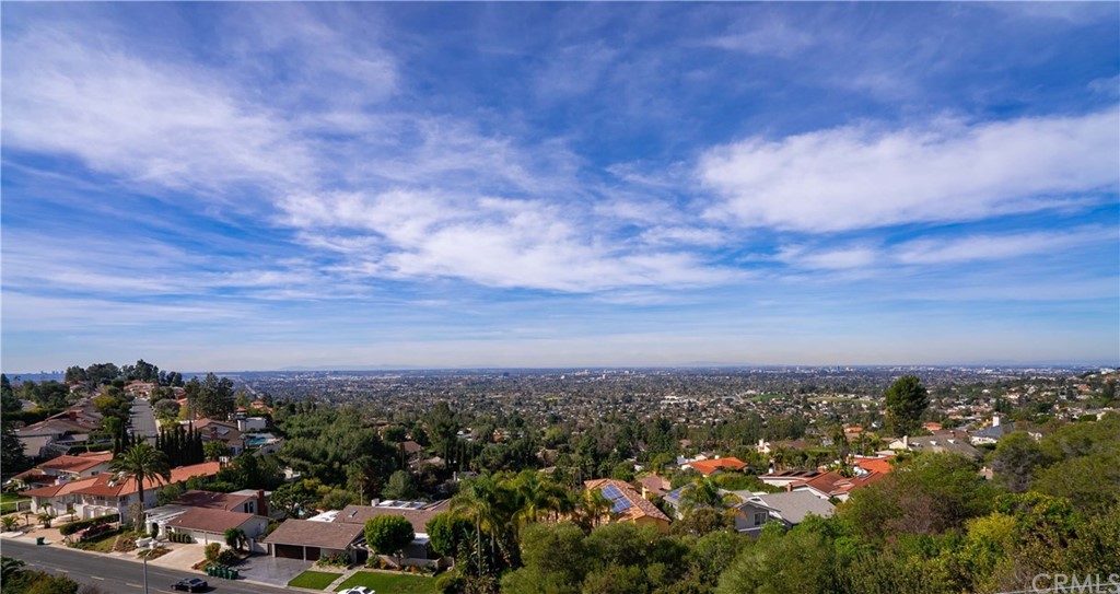 One of the most incredible view homes at the top of North Tustin Hills. Catalina and ocean views!