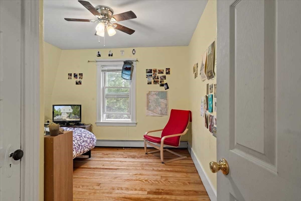 3 Wallace Street Worcester, MA 01605 - Photo 19 of 29 a living room with furniture and a window