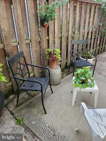 a view of outdoor space with seating area