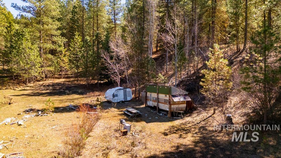 5 Sunset Trail Banks, ID 83602 - Photo 25 of 25 View of yard featuring a deck and a storage shed