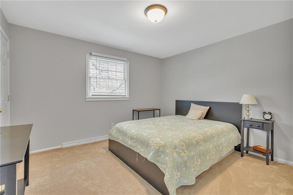 100 Roosevelt Drive Monaca, PA 15061 - Photo 26 of 39 a bedroom with a bed and window