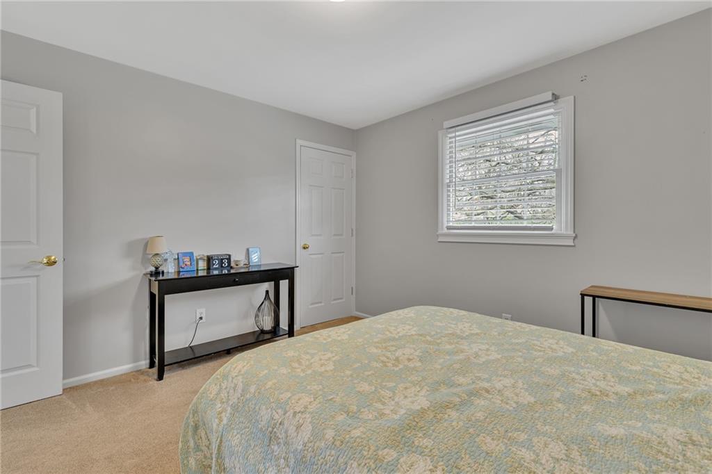 100 Roosevelt Drive Monaca, PA 15061 - Photo 27 of 39 a bedroom with a bed and window