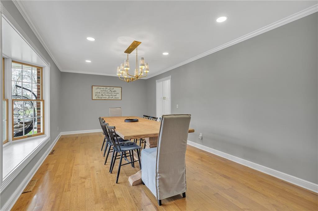100 Roosevelt Drive Monaca, PA 15061 - Photo 4 of 39 a view of a dining room with furniture and wooden floor