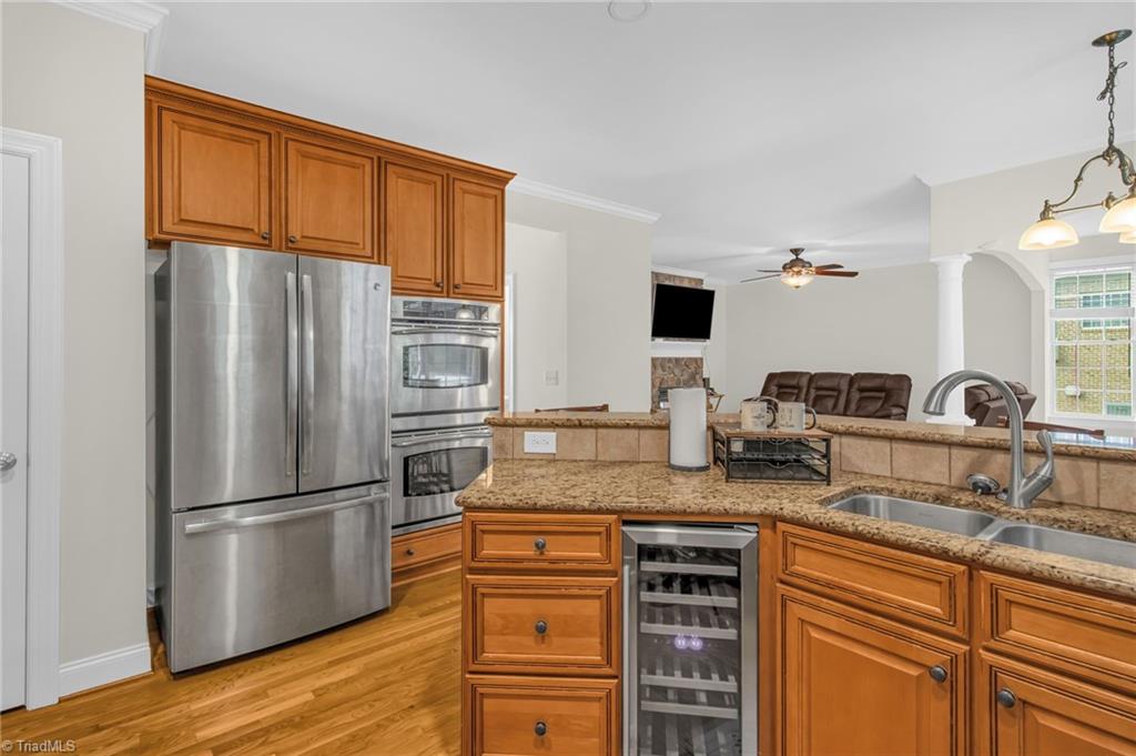 8916 Grove Park Drive Oak Ridge, NC 27310 - Photo 13 of 29 Beverage refrigerator, refrigerator and double oven