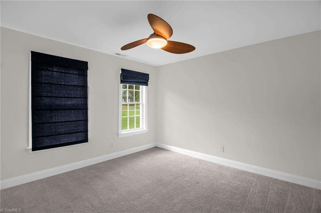 8916 Grove Park Drive Oak Ridge, NC 27310 - Photo 18 of 29 Bedroom 2