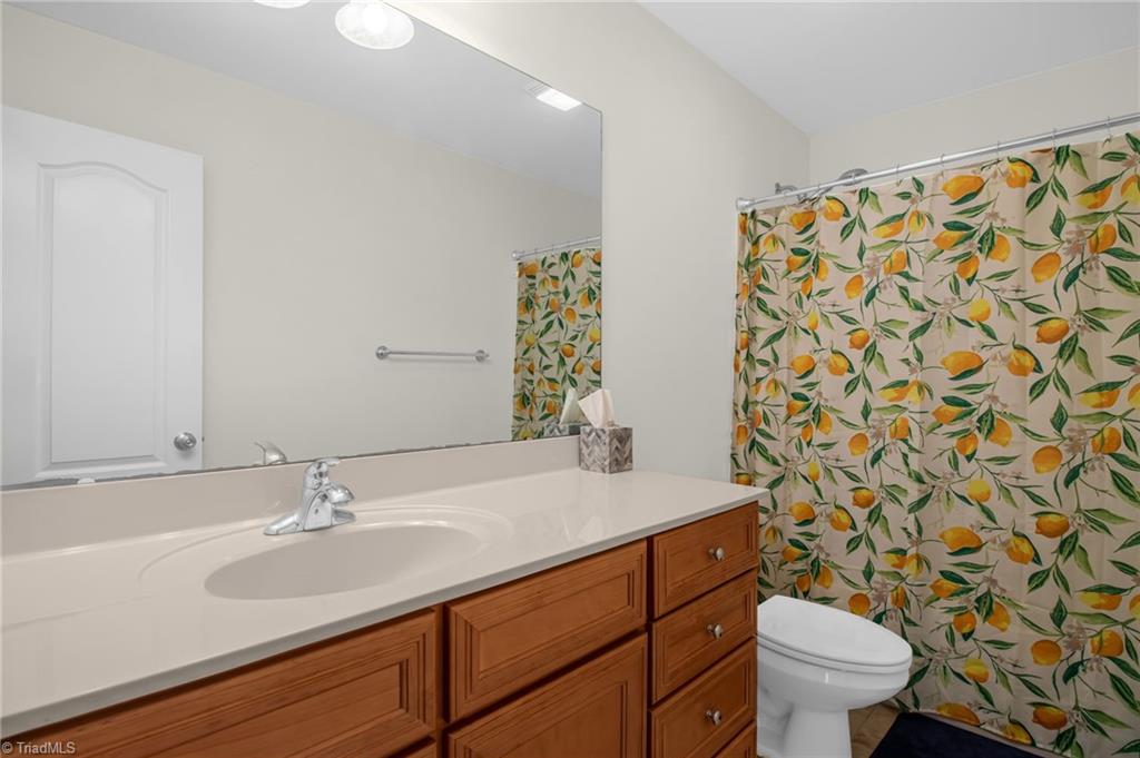 8916 Grove Park Drive Oak Ridge, NC 27310 - Photo 21 of 29 Bathroom 2