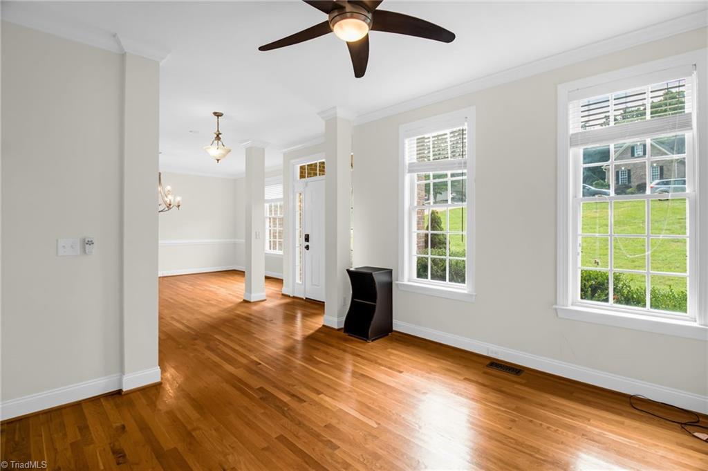 8916 Grove Park Drive Oak Ridge, NC 27310 - Photo 5 of 29 Formal living room and front door entry