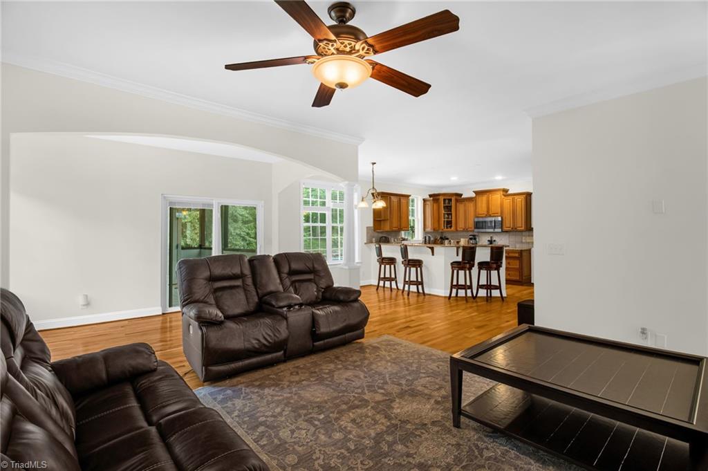 8916 Grove Park Drive Oak Ridge, NC 27310 - Photo 8 of 29 Den and kitchen
