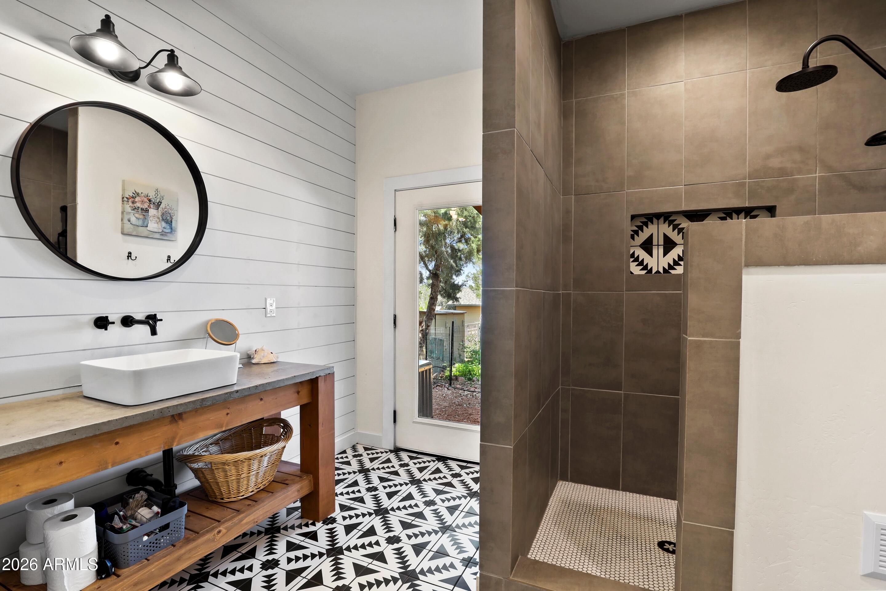102 North Lookout Point Payson, AZ 85541 - Photo 11 of 25 a bathroom with a sink and a mirror
