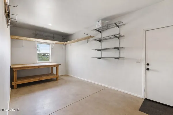 a picture of a bench in front of a window