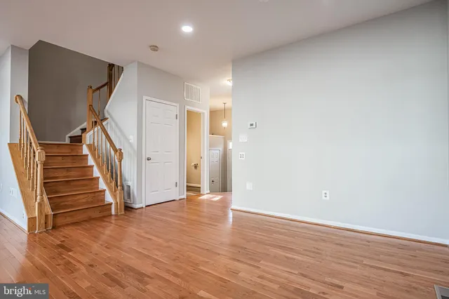 a view of entryway with wooden floor