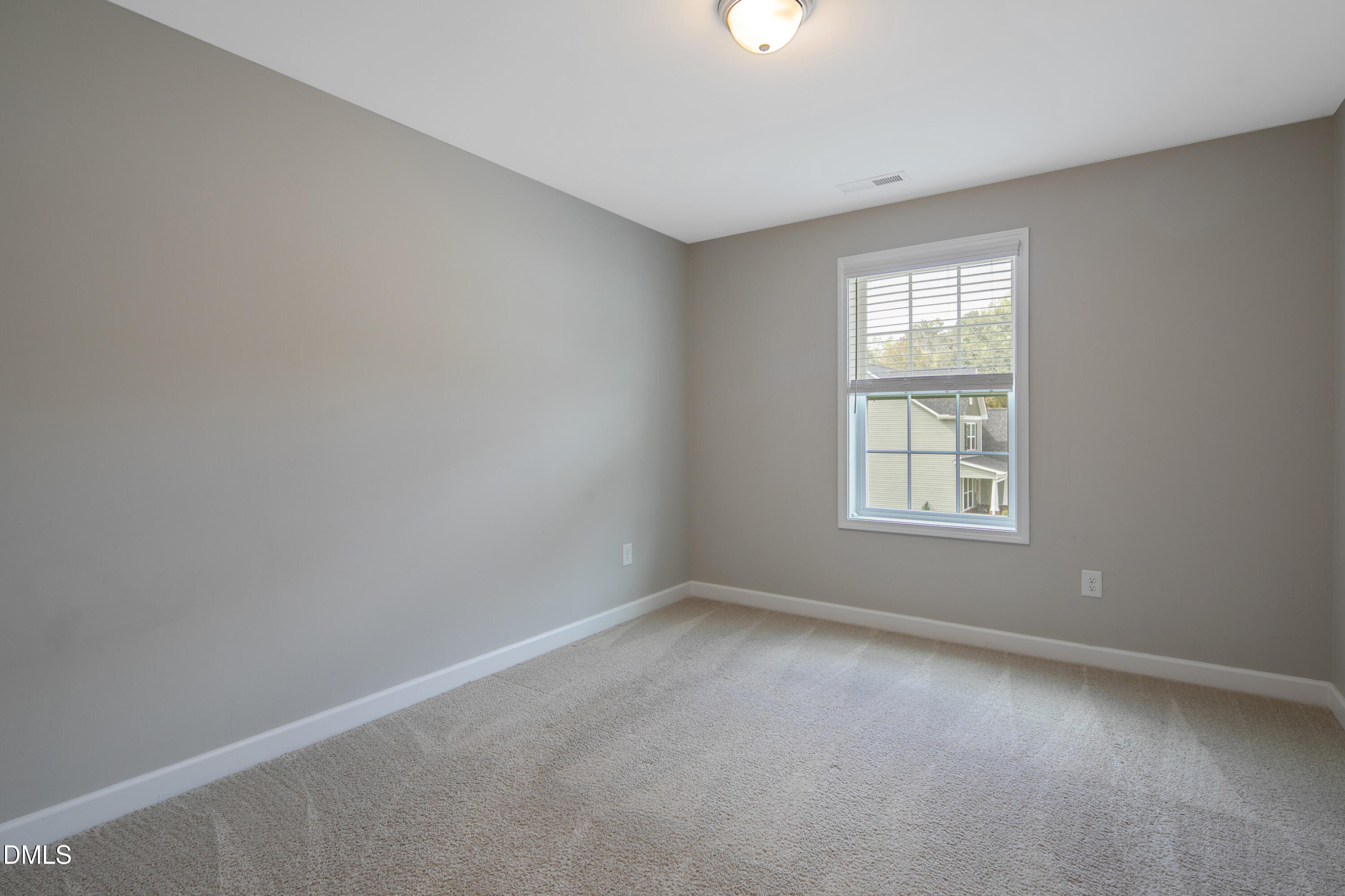 296 Birch Avenue Spring Lake, NC 28390 - Photo 25 of 37 an empty room with a window