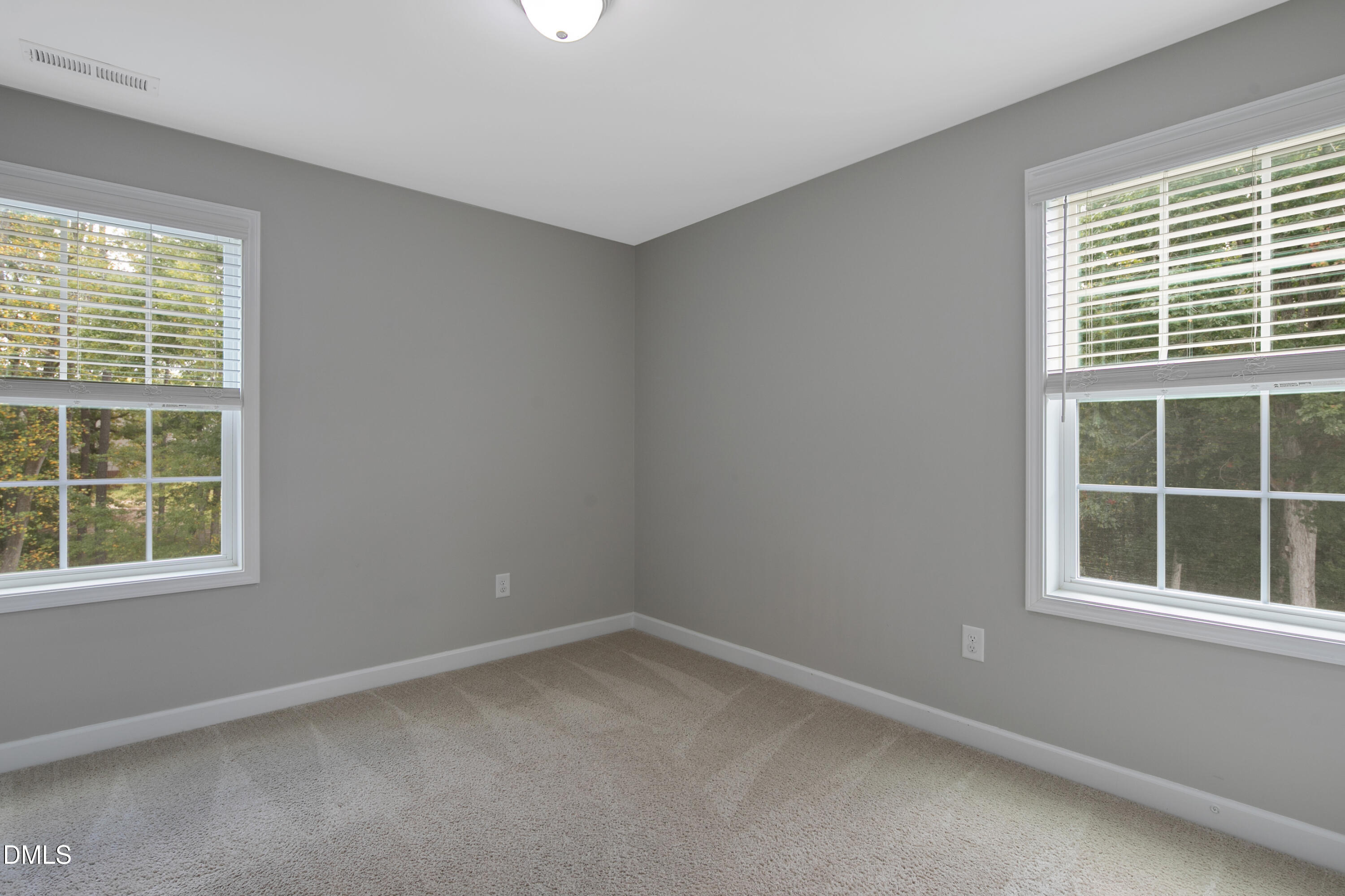 296 Birch Avenue Spring Lake, NC 28390 - Photo 28 of 37 an empty room with a window