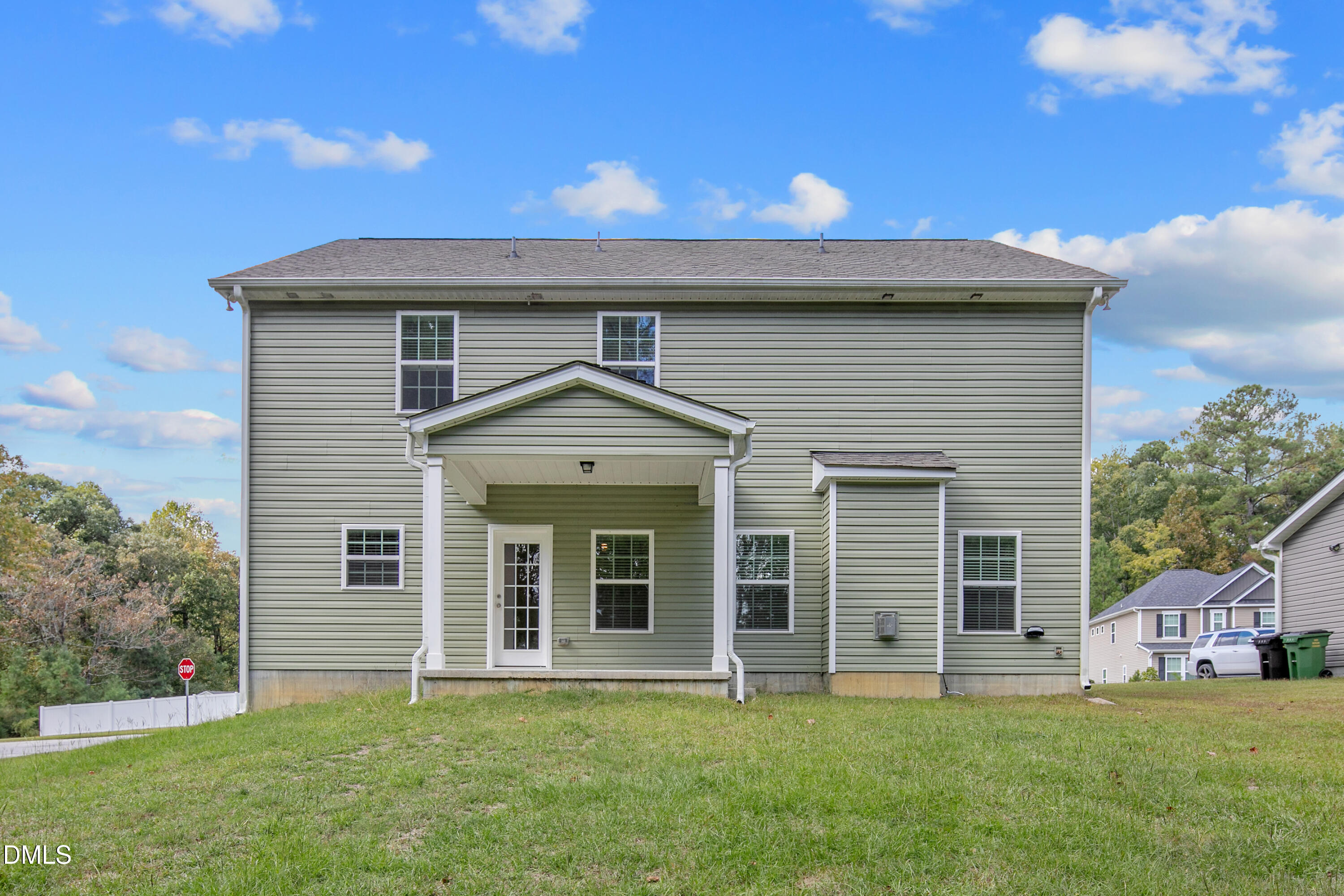 296 Birch Avenue Spring Lake, NC 28390 - Photo 30 of 37 a front view of a house with a garden