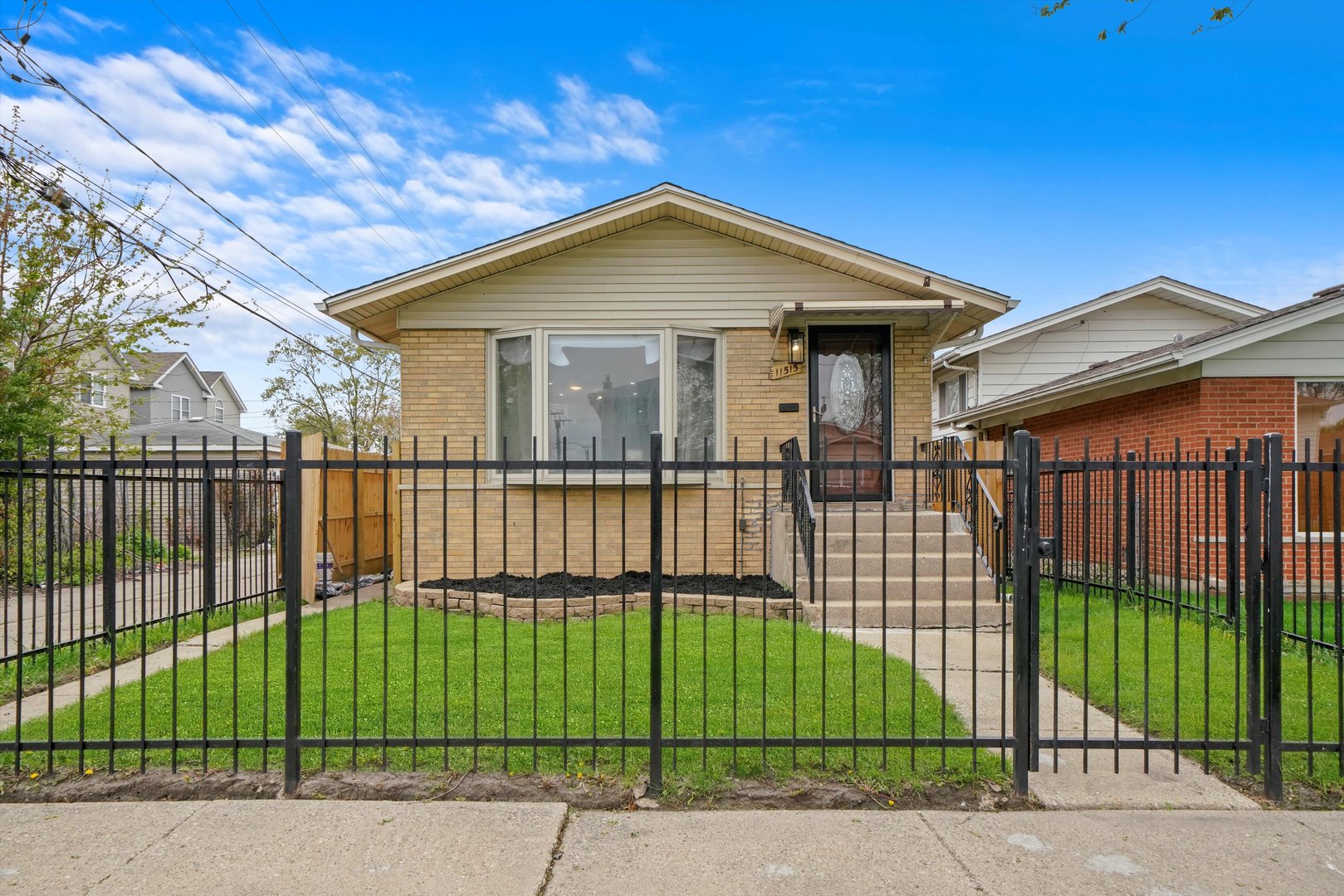 11515 South Aberdeen Street Chicago, IL 60643 - Photo 1 of 1 a view of a house with a small yard and plants