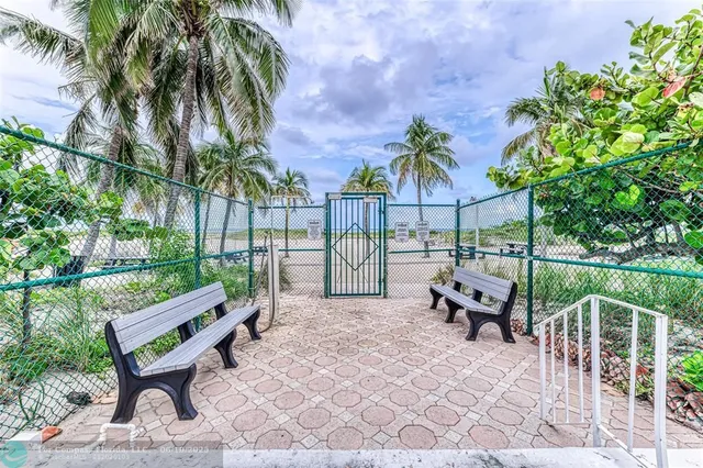 a view of a backyard with a patio