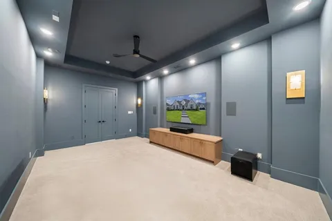 a room with furniture and a flat screen tv