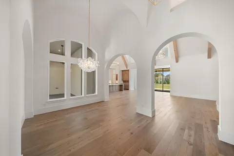 a view of entryway with wooden floor